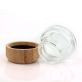 wholesale 20ml clear round facial cream cosmetic packaging glass jar with bamboo wood cap